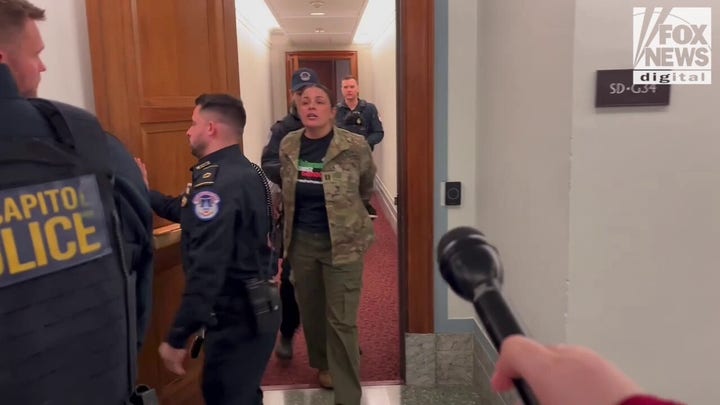 Protesters calling for Gaza accountability led out of Hegseth hearing